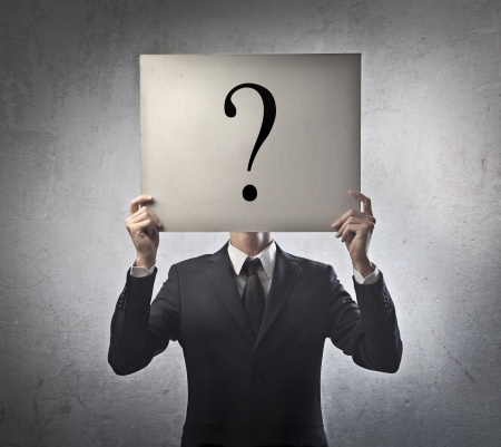 Businessman with a question mark instead of the face