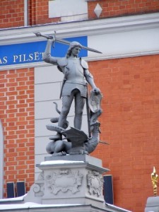 Sculpture of man slaying dragon decorating House of the Blackheads in Riga, Latvia