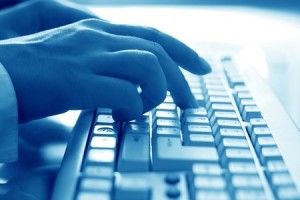 girl hands typing on keyboard macro close up