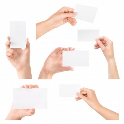 Female hand holding blank transparent business card in hand Collection set Isolated on white