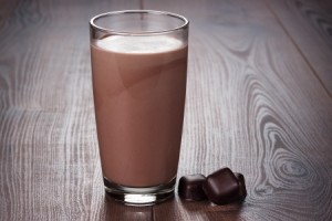 glass of chocolate milkshake on the table