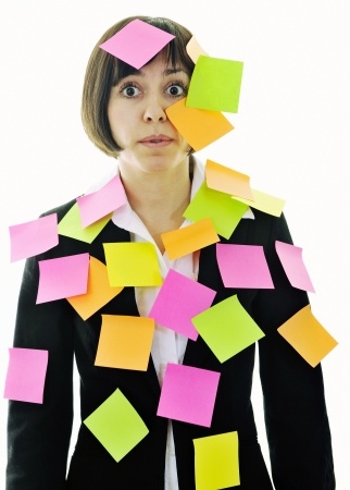 one frustrated young business woman with many of post it