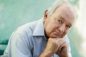 Seniors portrait of contemplative old caucasian man looking at camera