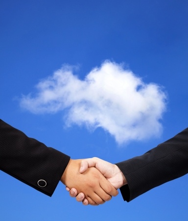 business handshake with cloud computing concept