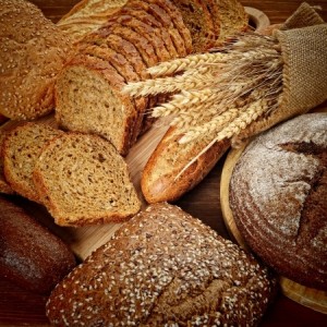 fresh bread and wheat on the wooden