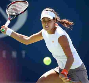 hitting a tennis ball