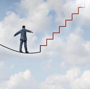 man on stairway tightrope