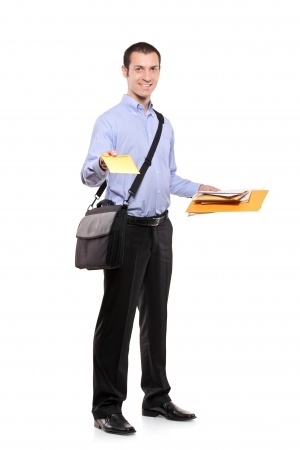 A postman delivering mail isolated on white background