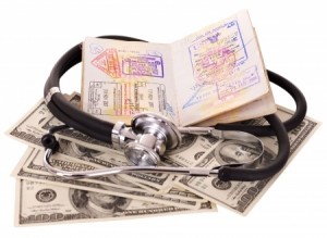 Medical still life with stethoscope, money and passport.