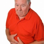 Old man with stomache ache - isolated