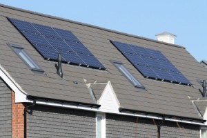 Solar photovoltaic panel array on house roof
