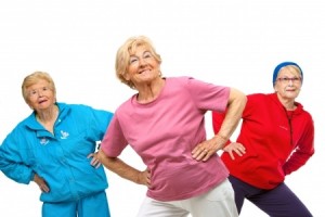 Threesome group of senior women doing stretching exercise Isolated on white