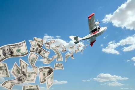 of hydroplane flying in blue sky, rain down