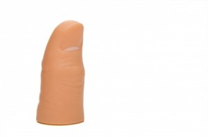 A single prosthetic thumb ready for a patient.