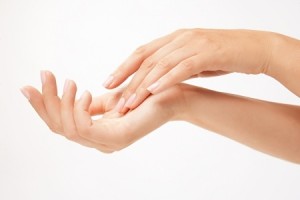 Beautiful woman's hands on the white backround