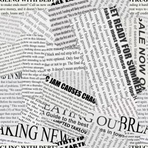 Black and white repeating torn newspaper background
