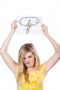Image of a cute teenage girl with storm cloud giving angry expressions drawing, isolated on white background.