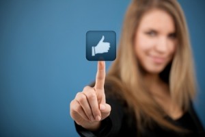 Social media concept Young woman click on the like button
