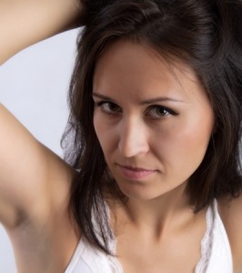 Woman showing armpit