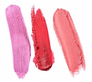 close up of a smudged lipstick on white background