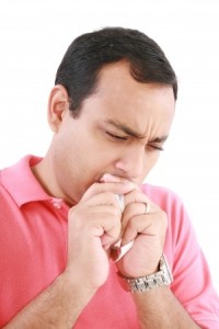 coughing sick man
