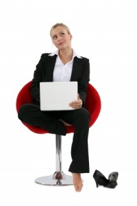 Blond with laptop barefoot