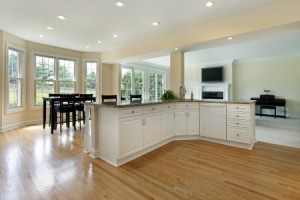 Large kitchen in remodeled home with eating area