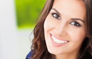 Portrait of beautiful young happy smiling woman, outdoors, with copyspace
