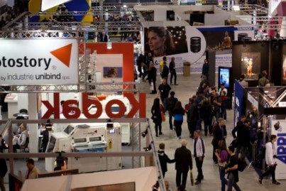 Video of people visiting stands at Photo