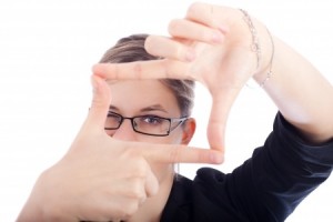 businesswoman framing her face