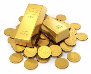 heap of golden ingots or bullions and gold money coins