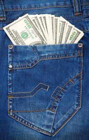 jeans pocket texture background and dollars