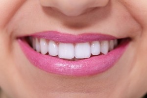 Close up of female perfectly white healthy toothy smile.