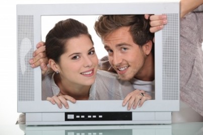 Couple in a television screen