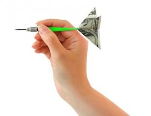 Hand and money darts isolated on white background