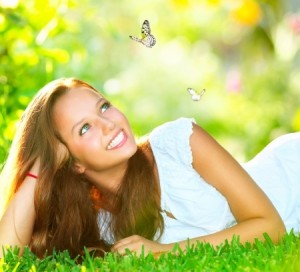 Spring Beauty Beautiful Girl Lying on Green Grass outdoor