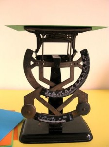a letter balance and colorful greeting cards
