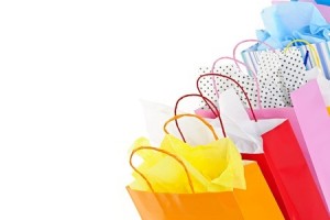 Many colorful shopping bags on white background