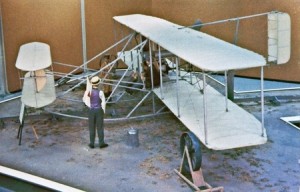 depicting the era of the Wright Brothers working on building an airplane
