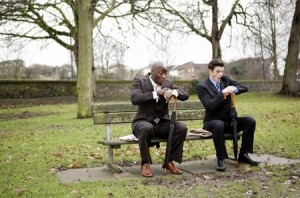 Businessmen in shock after looking at their watches