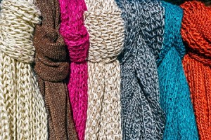 Wool scarves of various colors, exposed for sale