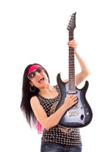 Hippie woman with electric guitar isolated on white background