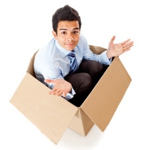 Man in a box looking frustrated for a failed delivery - isolated