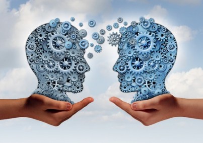 group of machine gears shaped as a human head