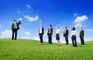 Group of green business people with leader