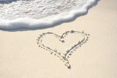Heart Drawn in the Sand on a Beach