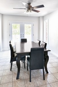 Room with dining table and chairs in upscale home
