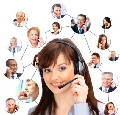 A group of people talking on the phone