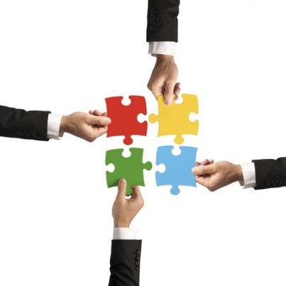 Teamwork and partnership concept with puzzle