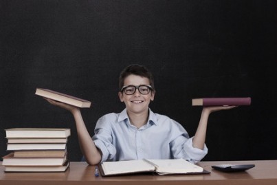 boy with books on the study table